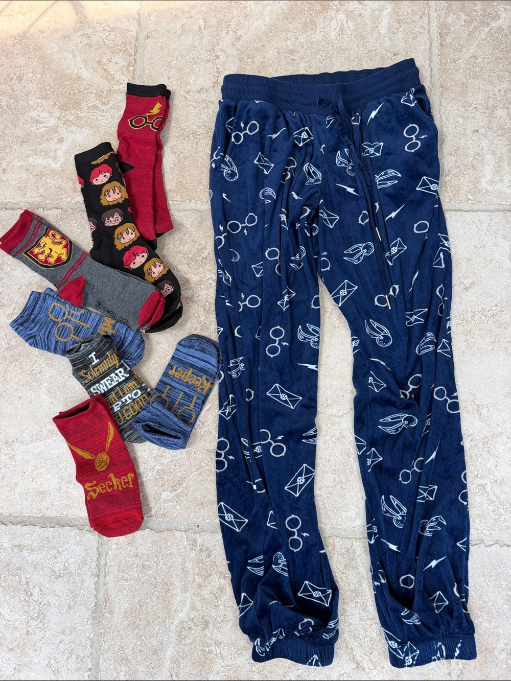 Harry Potter lounge pants size small & 7 pair of assorted socks.
